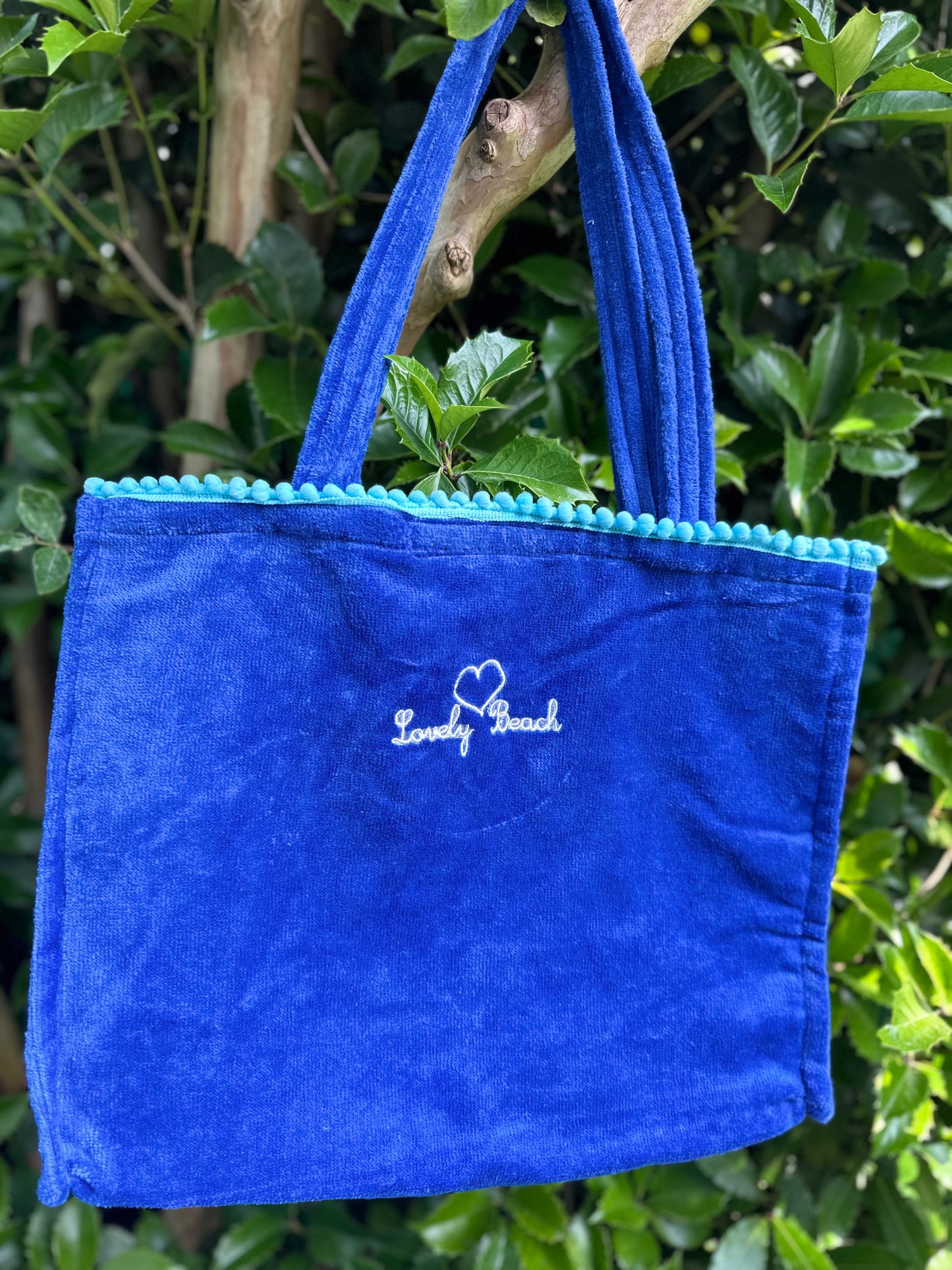 Borsa mare Marisol con pompon