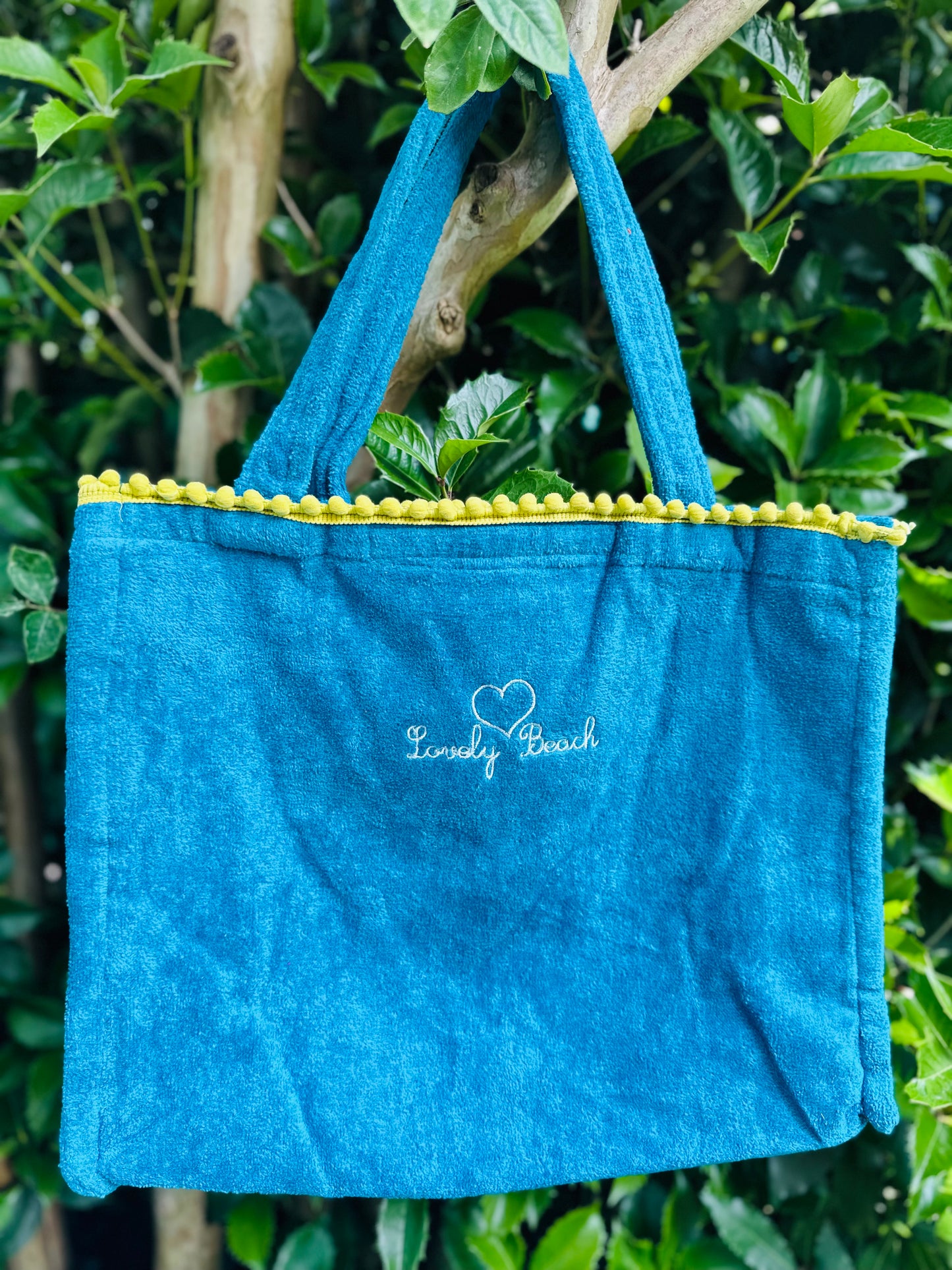 Borsa mare Marisol con pompon