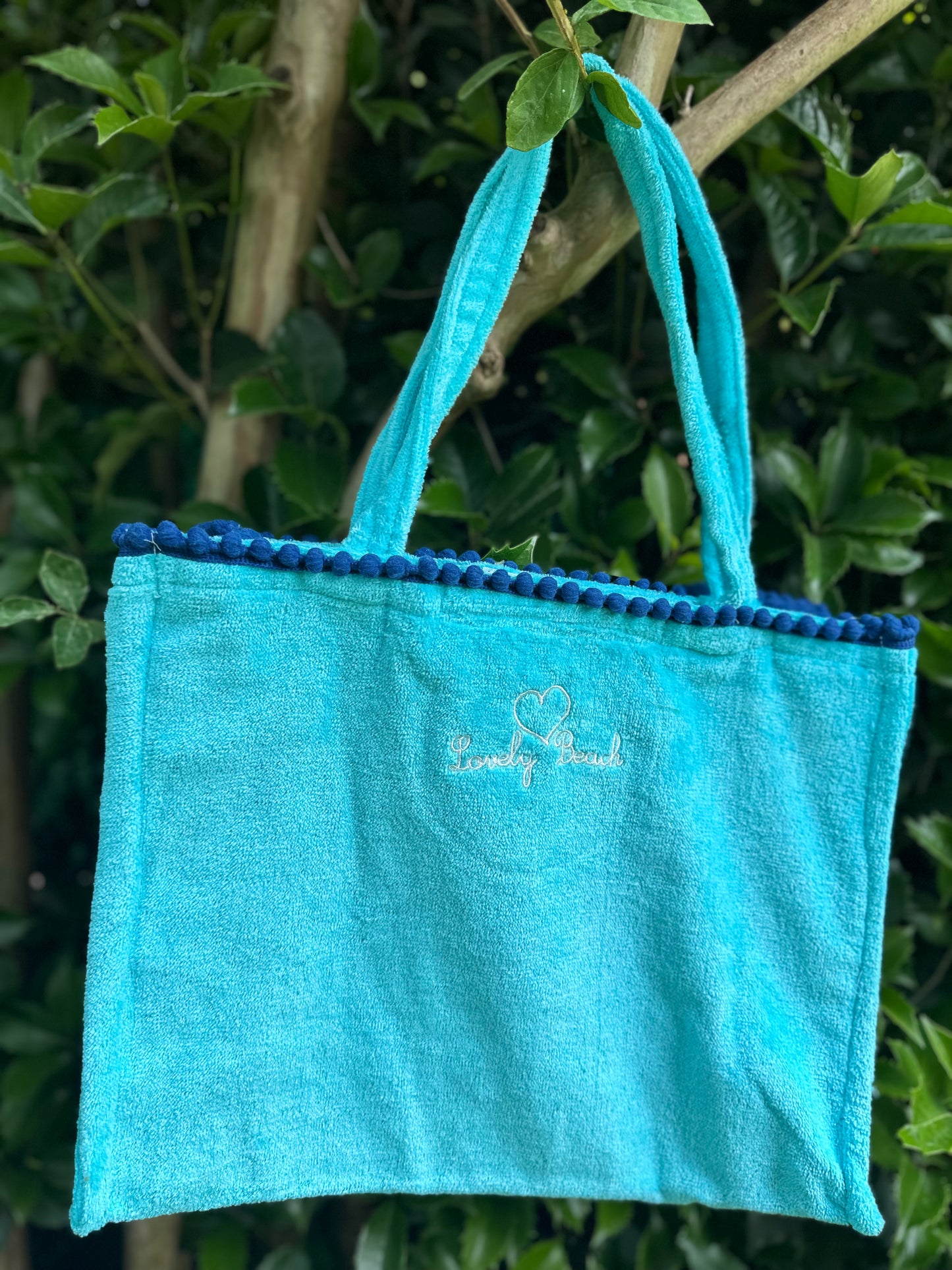 Borsa mare Marisol con pompon