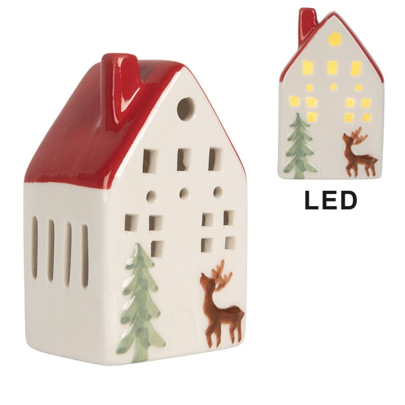 Casetta in ceramica bianca con cervo e pino con LED, h 10 cm